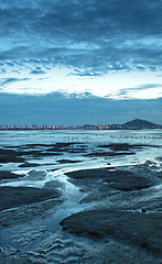 Image showing Sunset in Hong Kong along the coast at dusk 