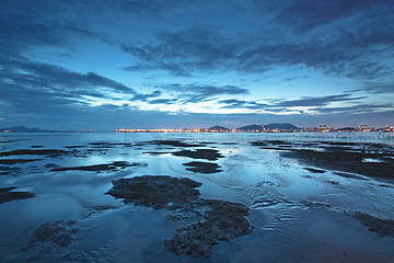 Image showing Sunset in Hong Kong along the coast at dusk 