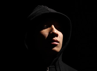 Image showing Monochrome picture of a guy in a hood 