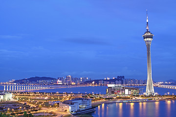 Image showing Urban landscape of Macau with famous traveling tower under sky n