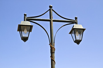 Image showing Street lamps isolated on blue sky 