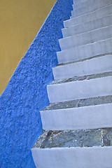 Image showing White stairs and blue wall