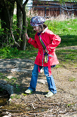 Image showing Happy Cute Little Girl At A Lake