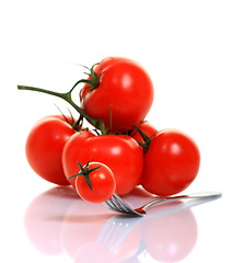 Image showing Red tomato on a fork.