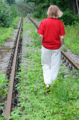 Image showing Walking Away Along Abandoned Railroad Track