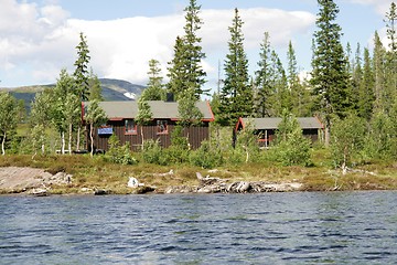 Image showing Cottage by a lake