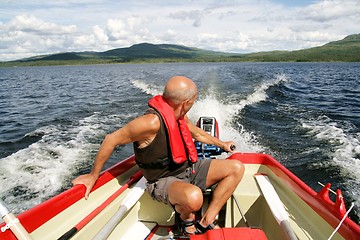 Image showing Man in motor boat