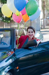 Image showing Beautiful brunette woman in car