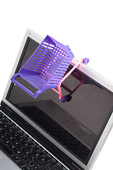 Image showing Laptop with a shopping-cart