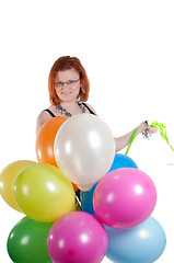 Image showing Beautiful woman with multicolored air balloons