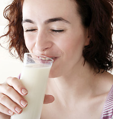 Image showing Young people eating milk with cereals