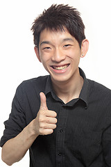 Image showing Portrait of hand showing goodluck sign against white background 