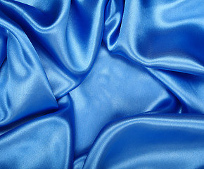 Image showing Smooth elegant blue silk as background 