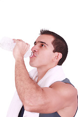 Image showing Man drinking water after the gym 