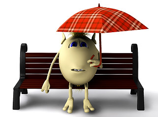 Image showing Puppet hide itself under umbrella from rain