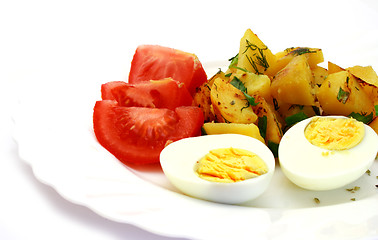 Image showing Tomatoes laying next to potatoes and eggs