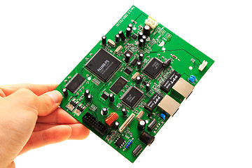 Image showing Human hand circuit board on white background