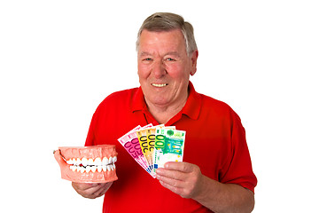 Image showing Senior with teeth model