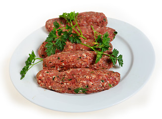 Image showing Raw lamb kofta on a plate