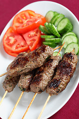 Image showing Arab lamb kofta on a plate vertical