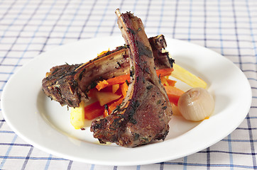 Image showing Herbed lamb chops and vegetables