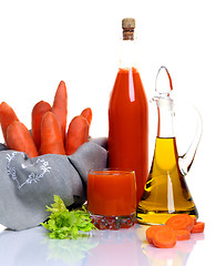 Image showing Fresh raw carrot and vegetable juice.