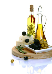 Image showing Feta, black olives and green olives with rosemary. 