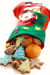 Image showing Beautiful Christmas stockings with gifts.