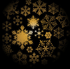 Image showing Golden snowflakes on black background