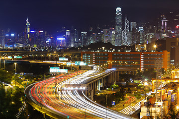 Image showing modern city and highway at night