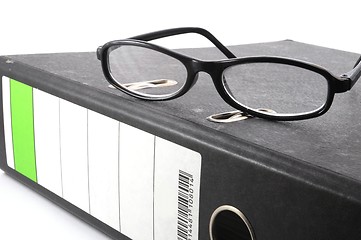 Image showing eye glasses and folder