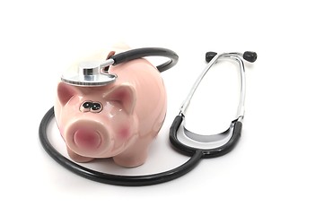 Image showing stethoscope and piggy bank