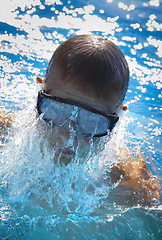 Image showing Detail of young man swimming 