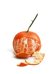 Image showing Clementine partly peeled