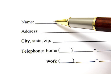 Image showing Pen isolated on a blank signature paper 