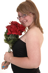 Image showing Closeup of girl with roses.