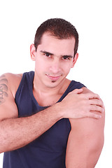 Image showing Smiling young strong man. Isolated over white background 