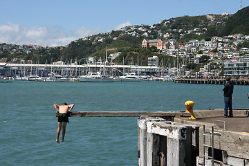 Image showing hanging around