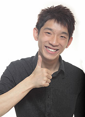 Image showing Portrait of hand showing goodluck sign against white background 