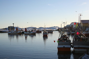 Image showing Fishing boats waiting to deliver their catch