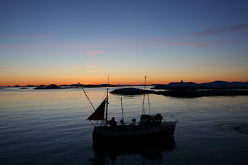 Image showing Fishing boat at sunset