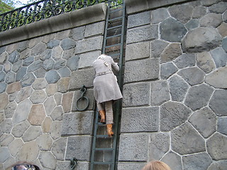 Image showing Climbing at ladder