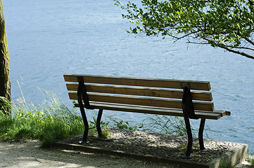 Image showing Empty bench on the lake