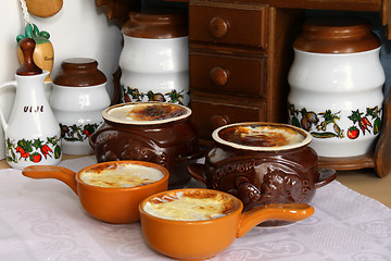 Image showing  House fermented baked milk in pottery.