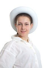 Image showing A young girl in a white hat