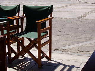 Image showing Cafe chairs in the sun