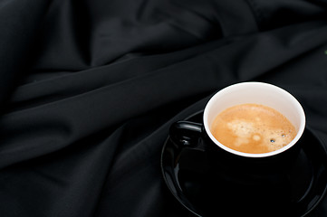 Image showing Cup of Coffee on Black Drapery