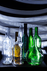 Image showing empty bottles in the dark night