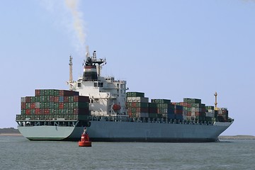 Image showing Cargo ship leaving port of Rotterdam