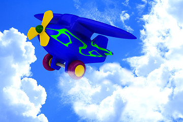 Image showing Plane with yellow propeller fly in sky